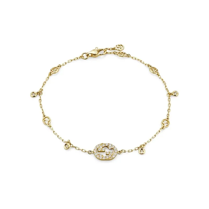 Bracciale Gucci Interlocking G in oro giallo 18 ct con ...