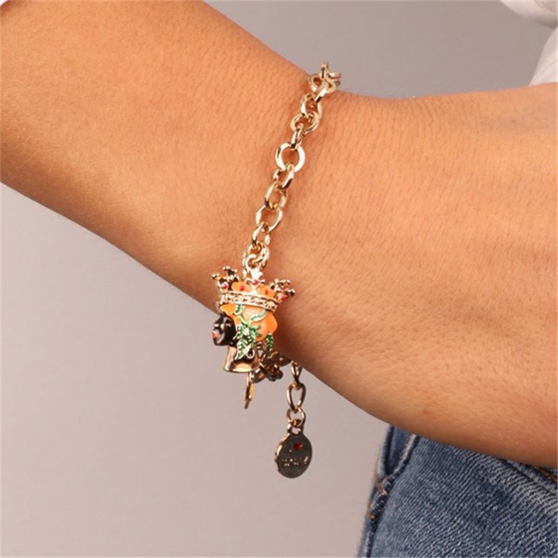 Bracciale in Metallo con testa di moro donna e simbolo di Trinacria impreziositi da smalti colorati